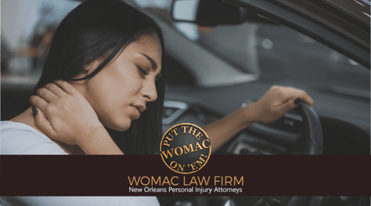 woman holding her neck